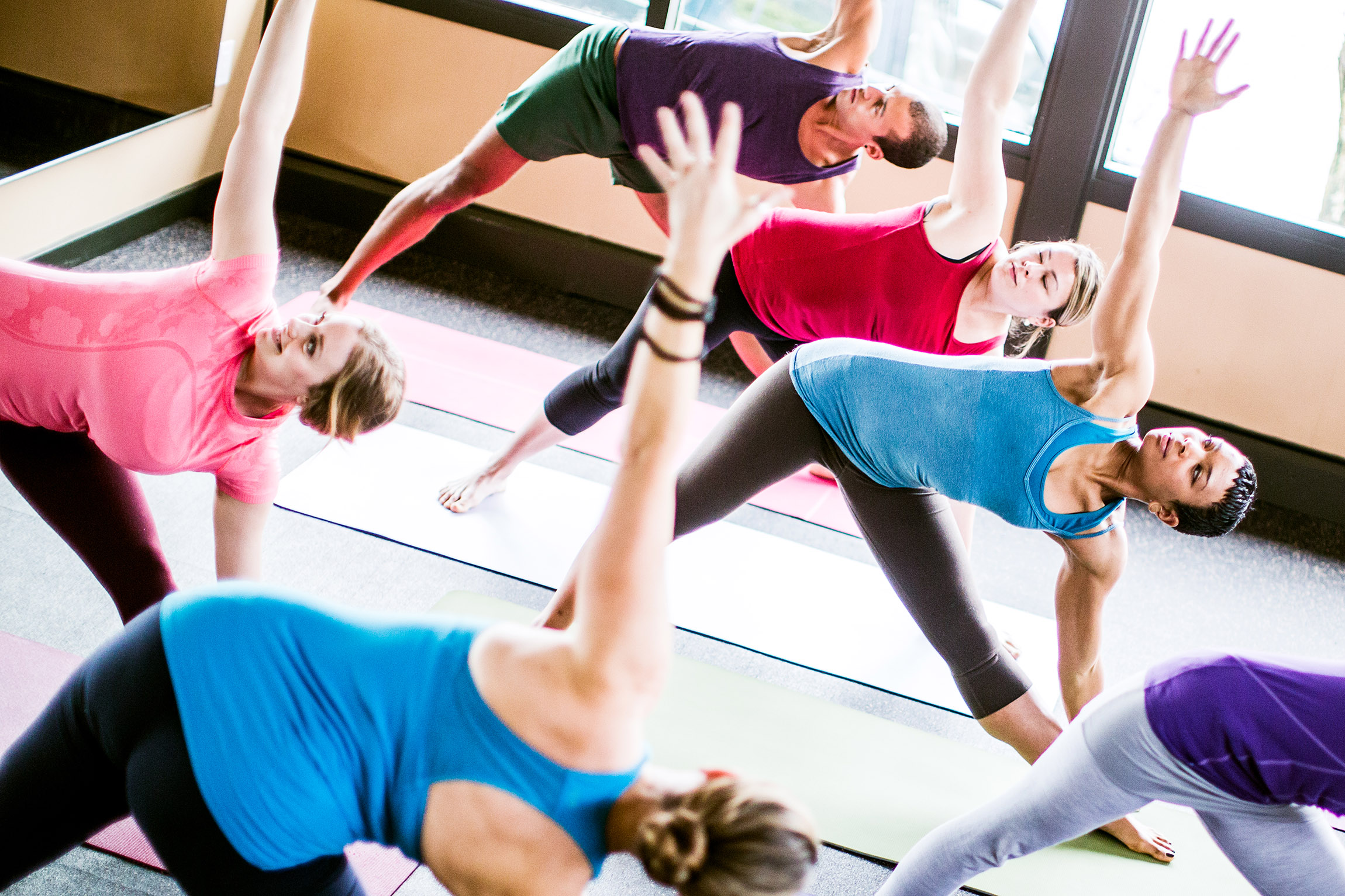 Adults doing Yoga